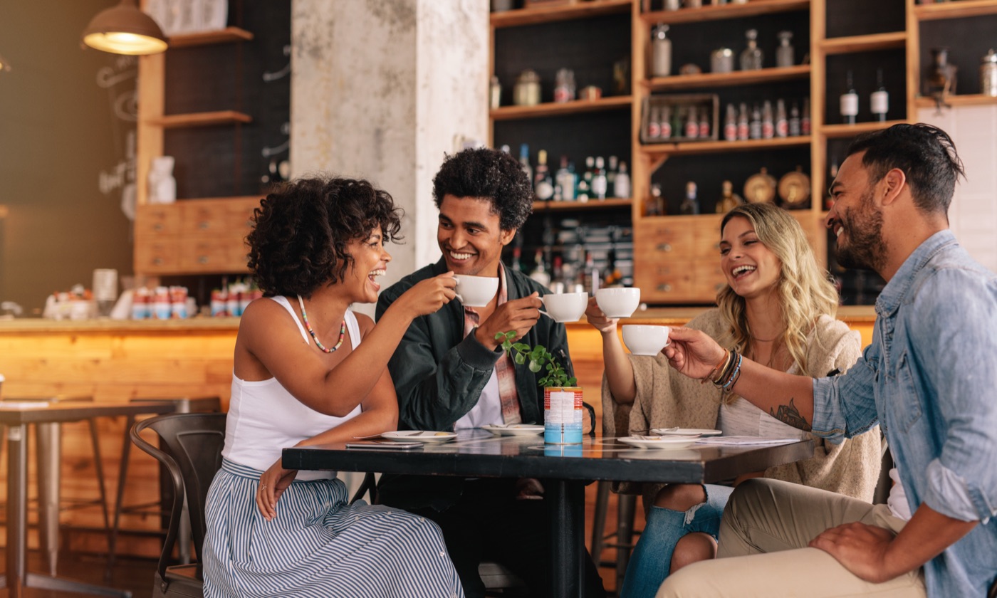 Friends enjoying a meal together at a local restaurant