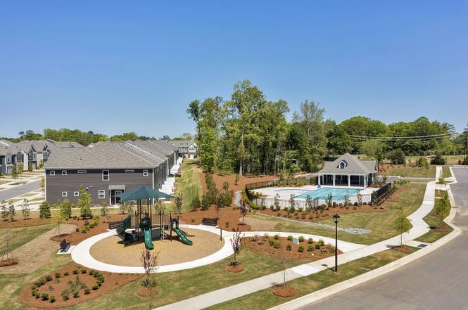 Aerial view of the Ellery at Aberdeen community pool, clubhouse, and playground